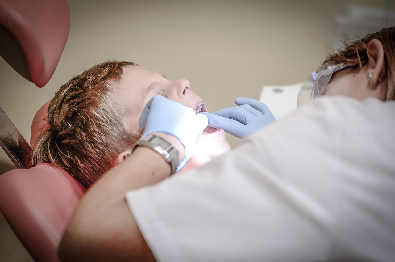 smiling patient dentist dental clinic
